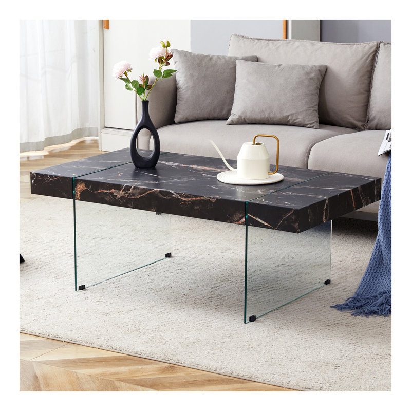 Table basse 43,3 po x 23,6 po en MDF à motif de marbre noir avec pieds en verre trempé. Convient au salon. Elle peut être utilisée non seulement comme table basse, mais aussi comme table d'appoint ou présentoir.