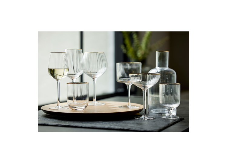 glassware sizes mixed types of glassware including wine glasses coupe glasses goblets and drinking glasses