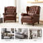 Fauteuil à oreilles en cuir véritable avec capitonnage à boutons Amyri-88605750