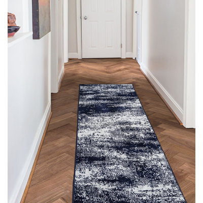 Tapis rectangulaire bleu marine / blanc en polypropylène touffeté à la machine Guntersville