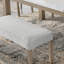 Banc rembourré Dunton, tissu gris clair avec pieds en bois d'hévéa