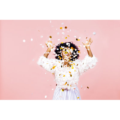 Woman Throwing Confetti - Wrapped Canvas Print