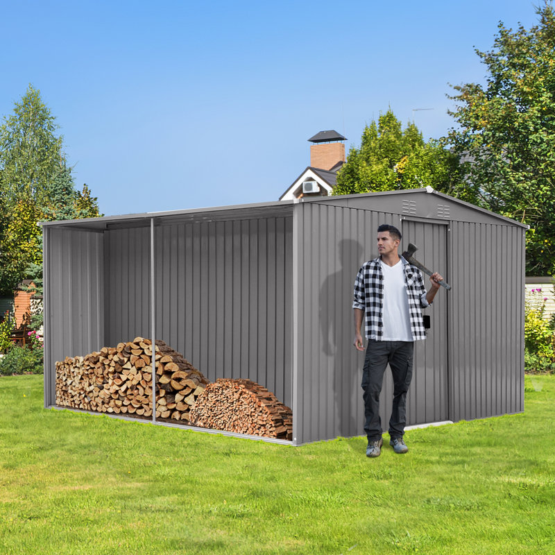 La nouvelle remise de rangement extérieure 13 x 11 pi possède deux fonctions: une remise en métal et une remise à bois de chauffage, plus adaptée à l'hiver