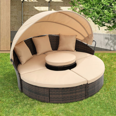 Luxurious All-Weather Outdoor Sofa Bed With Versatile Canopy And Lift Table