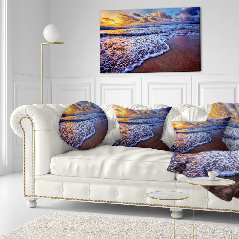 Coussin lombaire à ondulations à coucher de soleil sur mer mer shore