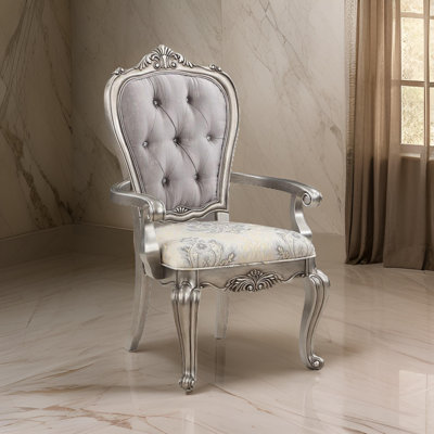 Chaise avec accoudoirs en velours capitonné Hristina