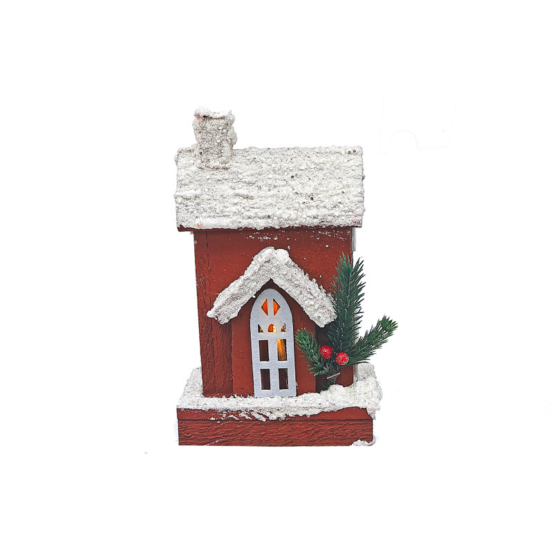 Maison en bois DEL recouverte de neige