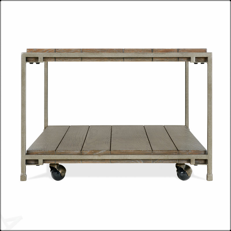 Table basse rectangulaire avec plateau en bois massif, rangement dissimulé et roulettes pour faciliter le déplacement, parfaite pour les salons modernes