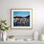 Three Happy Women and a Man Playing in the Water Framed