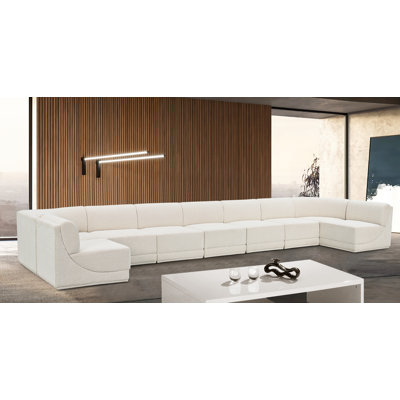 Ollie 9 - Piece Upholstered Sectional