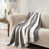 Gris anthracite / rayures blanches est en rupture de stock