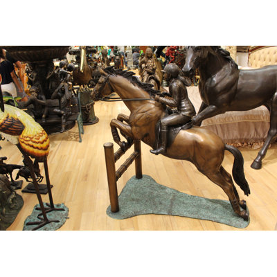 Jockey and Horse Jump a Fence Bronze Statue -  Size: 60"L x 30"W x 51"H.