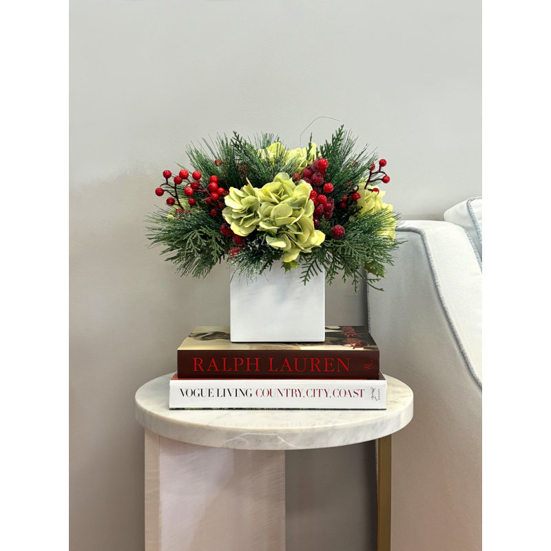 Hydrangeas and Berries Embellished with Festive Greens