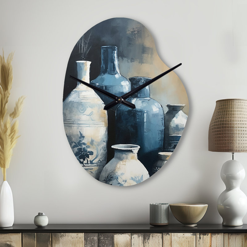 Horloge murale en métal bleu et crème Huria, Petit