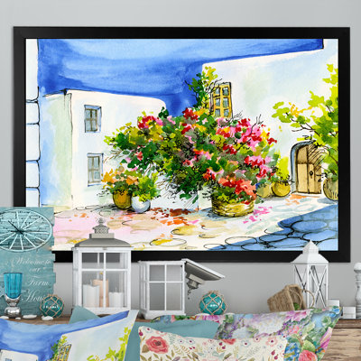 Fleurs colorées dans une maison méditerranéenne X - reproduction de cadre flottant sur toile