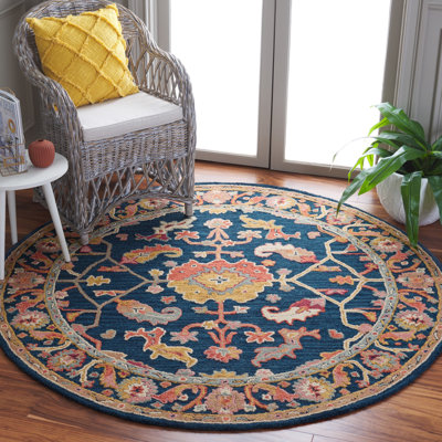 Menga Hand Tufted Wool Cotton Oriental Rug in Red/Navy