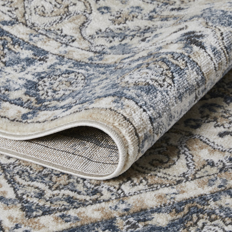 Aldijana Oriental Machine Woven Polypropylene Area Rug in Blue/Cream