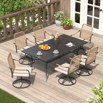 6 - Person 60'' L Outdoor Patio Dining Set With Cushioned Swivel Woven Rattan Chairs