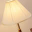 Lampes sur pied en noyer massif et cuivre