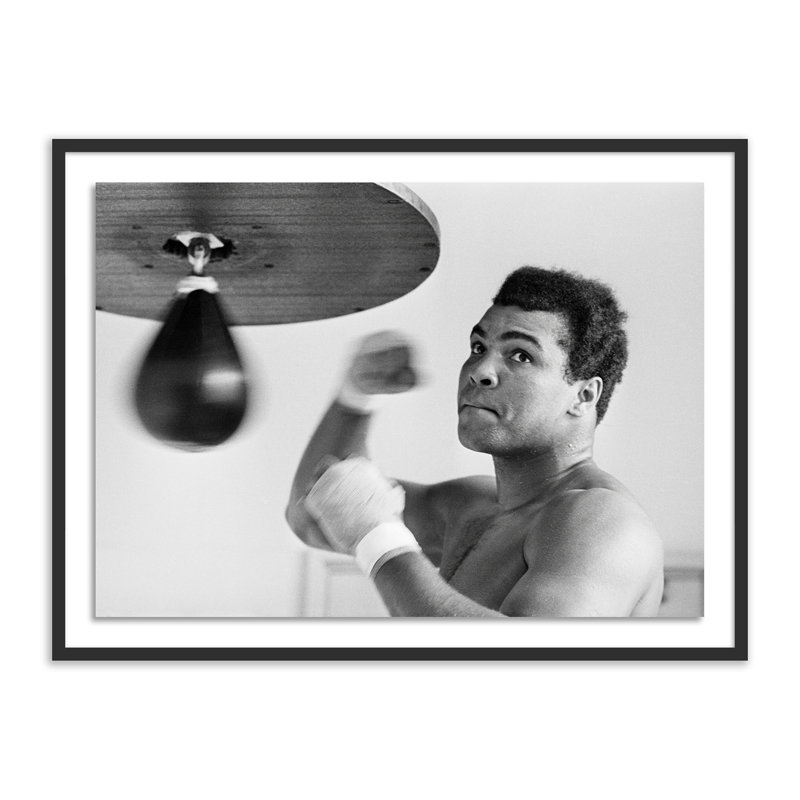Muhammad Ali Punching Bag Print by Getty Images, 24" H x 32" W, Black Maple Framed