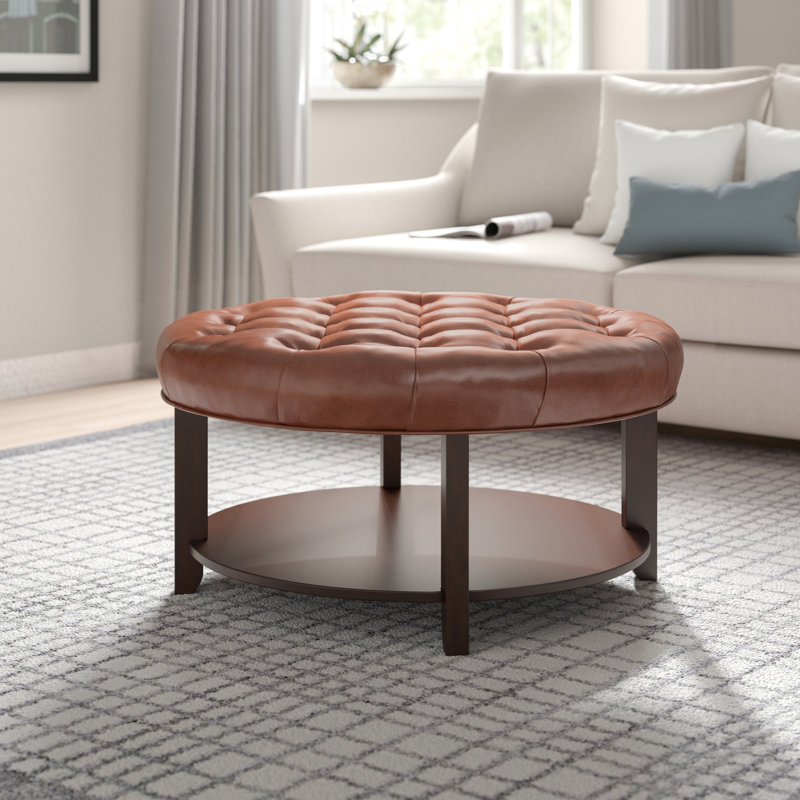 Jadaya Faux Leather and Rubberwood Round Ottoman with Open Shelf, Light Brown