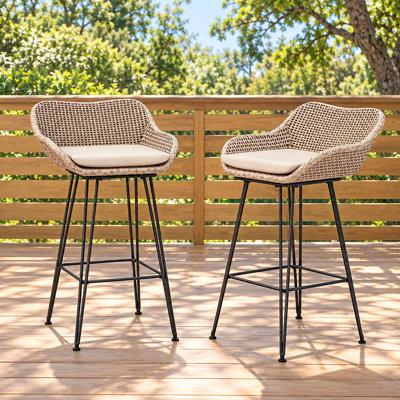 Set of 2 Outdoor Low Back Barstools with Woven Rattan Construction and Sturdy Iron Hairpin Legs, Plush Padded Water-Resistant Seat Cushions, Transitional Style Seating for Patio Bars, Decks, Porches, and Backyard Entertainment Gathering Spaces