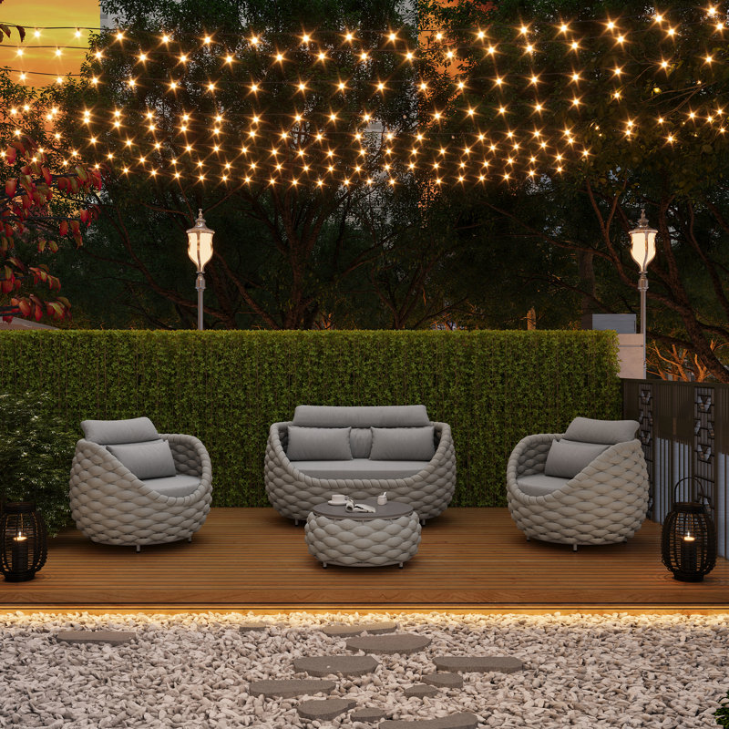 Ensemble de conversation en corde tressée en polyester pour 4 personnes avec ensemble de tables basses Chshions et faux marbre pour terrasse de balcon