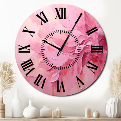 Horloge murale or et rose
