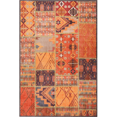 Tapis décoratif orange et brun