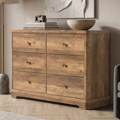 Commode 6 tiroirs avec base sculptée Burkhart