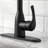 Matte Black High-Arc Kitchen Pull-Out Faucet, Single Handle, Four Water Flow Settings, Stainless Steel Body With Pull-Out Spray Head.