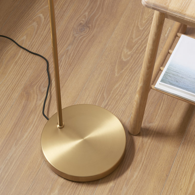 Thackinh Floor Lamp finished in Warm Brass and Cream