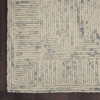 Tapis gris / ivoire en laine touffeté Jordy