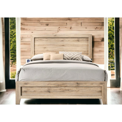 Grand lit naturel pour une ambiance de chambre à coucher tranquille avec tête de lit à panneau et mécanisme de glissière en métal