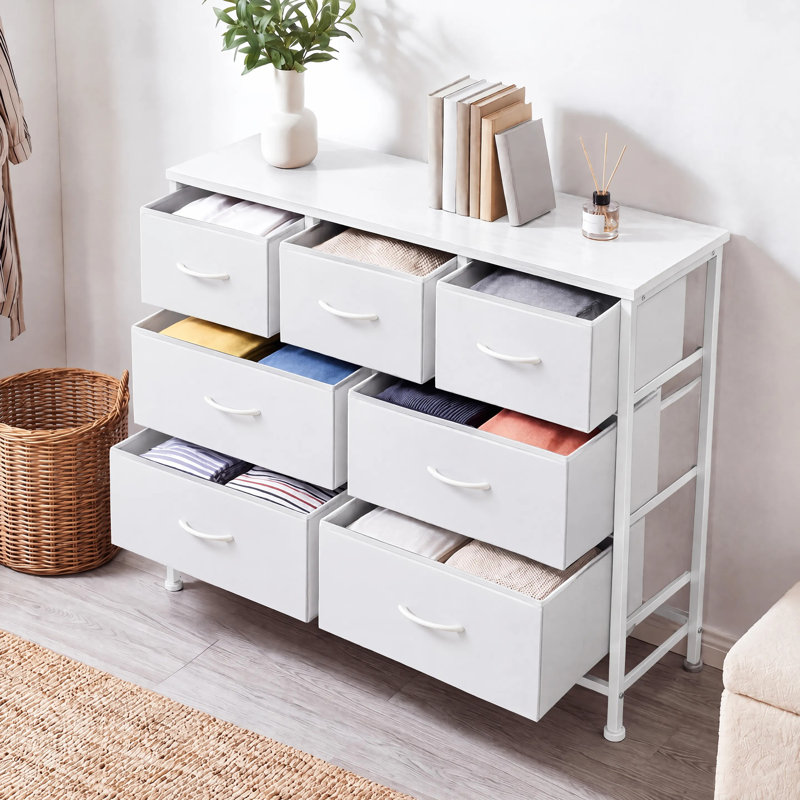 Commode moderne Verdi à 7 tiroirs en tissu, idéale pour le rangement dans la chambre à coucher., Blanc