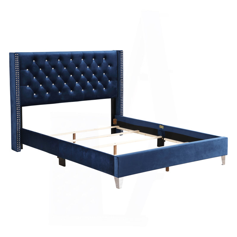 Élégant grand lit tapissier bleu marine