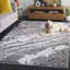 Tapis abstrait Kayliann Performance