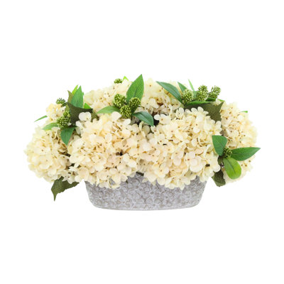 Arrangement d'hortensias et de sédums