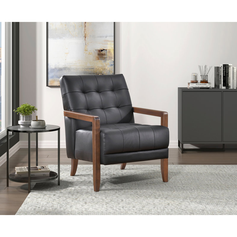 Fauteuil d'appoint en cuir noir tendance, coussin de dossier, pieds en bois au fini noyer, rembourrage en mousse haute à l'intérieur du revêtement de style moderne, coussin de siège rembourré