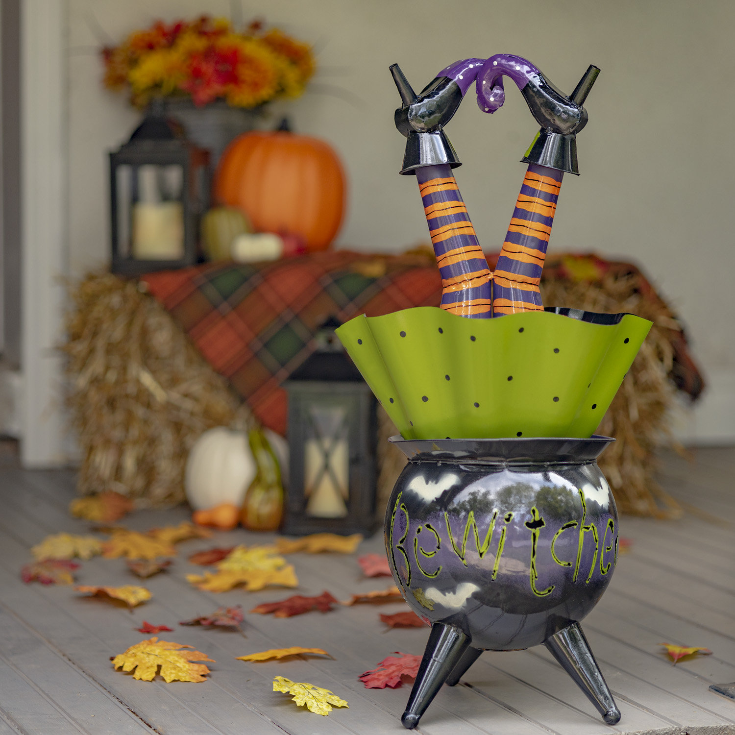 The Holiday Aisle® Bewitched Cauldron witch Legs Figurine | Wayfair