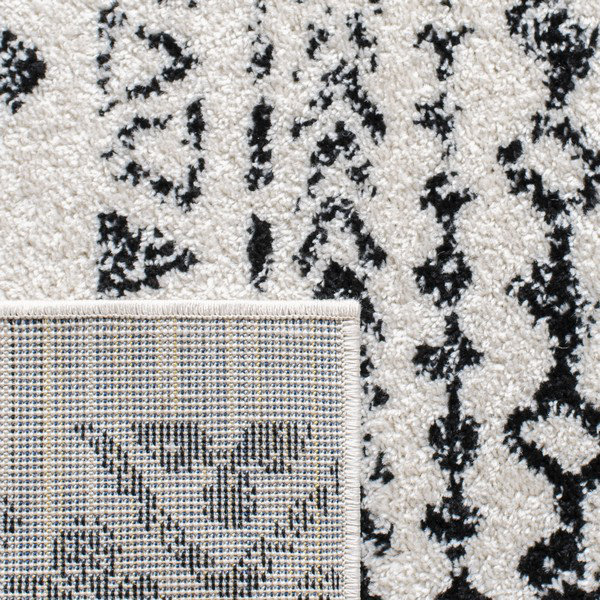 Canis Geometric Area Rug