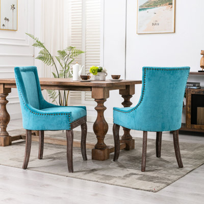 De 2 chaises de salle à manger bleues Ultra Side - Tissu épaissi, pieds en bois massif, tête de clou bronze, tissu à caractère neutre (2) bleu, tactile