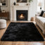 Tapis noir doux à poils longs
