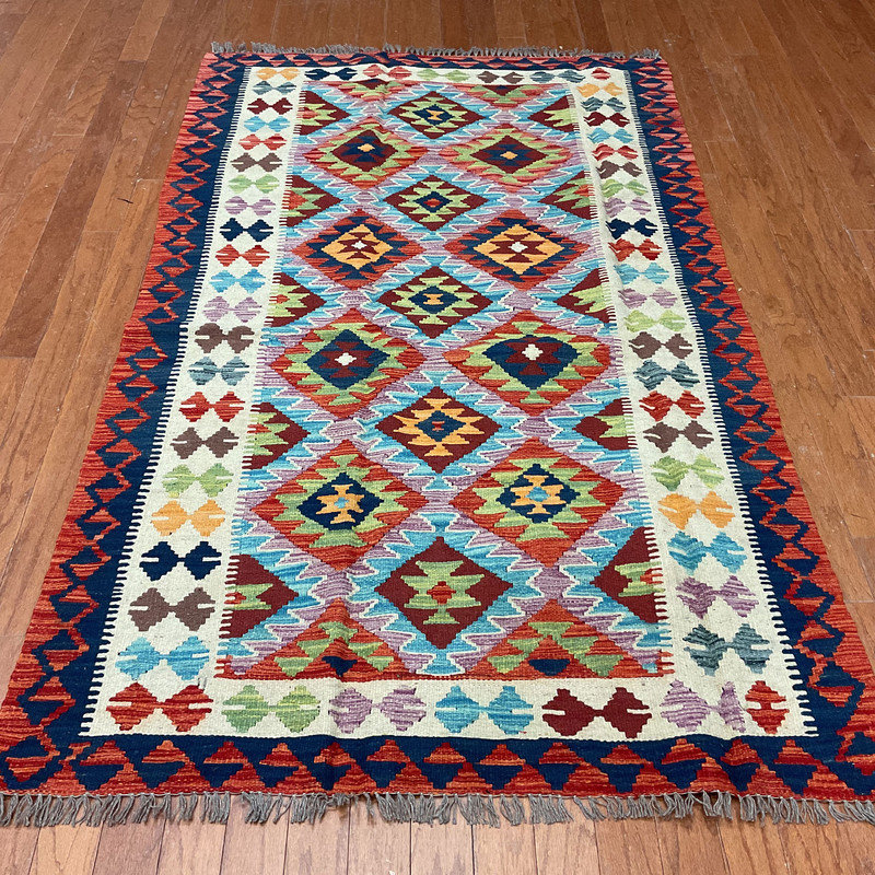 Tapis rouille unique de 3 pi 11 po x 6 pi 8 po