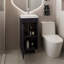 Meuble-lavabo autoportant avec une porte, deux tablettes, un meuble-lavabo en résine, noir