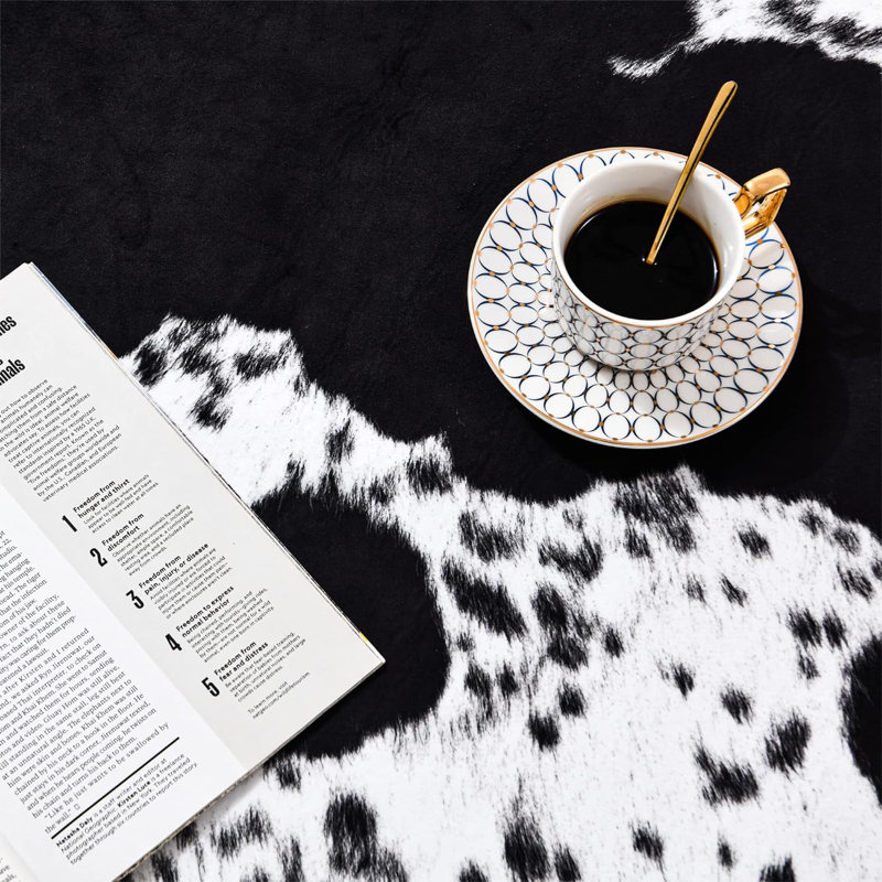 Ganote Animal Print Faux Cowhide Area Rug, Novelty 2'3" x 3'7", Black