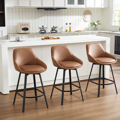 Janayshia Swivel Upholstered Faux Leather Counter Stool