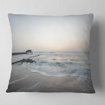 Coussin de plage bleu designart serene blue beach avec soleil blanc moderne