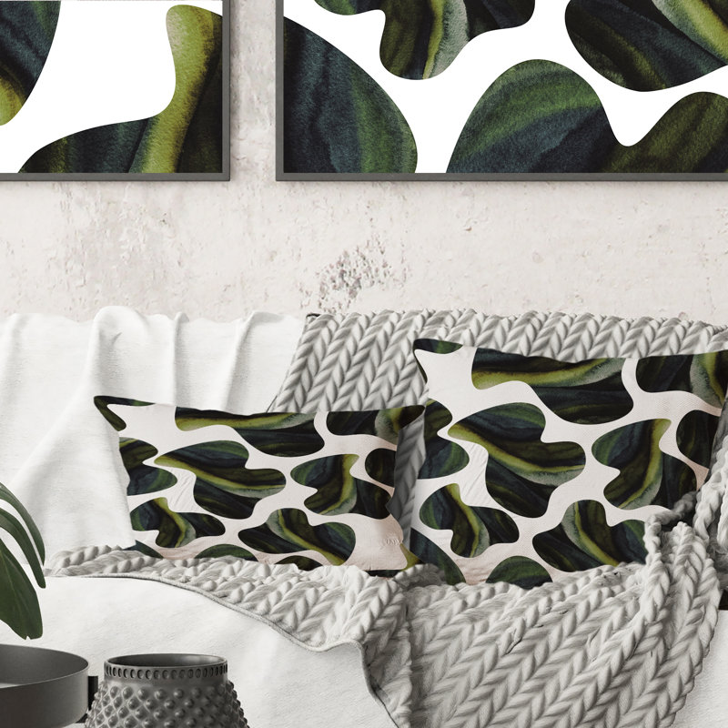 Coussin décoratif à motifs imprimés vert foncé sur fond blanc 1