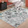 Tapis à motif floral ivoire et bleu